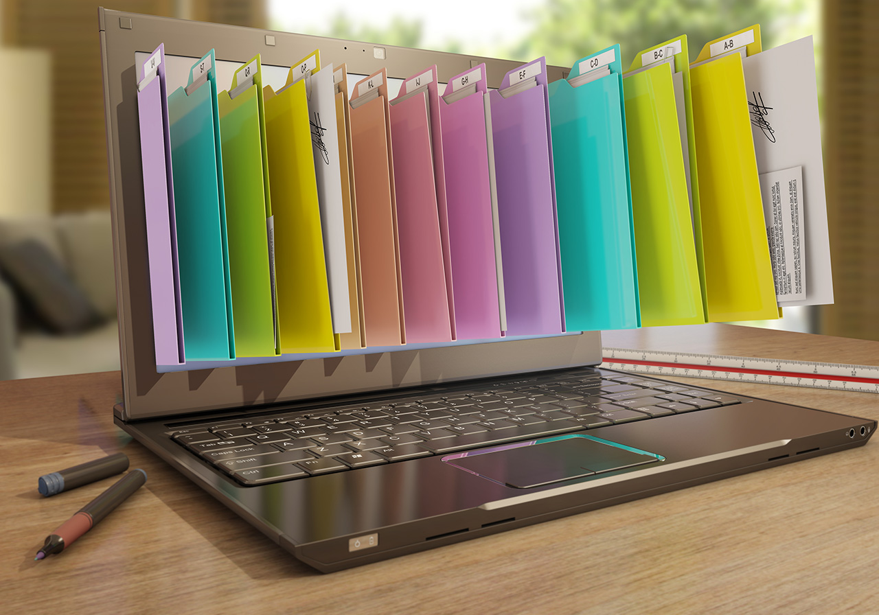 colorful-folders-popping-out-of-laptop-screen